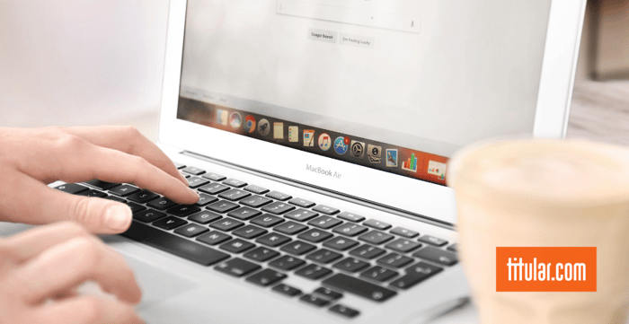 Back view of businessman with suitcase in hands looking at virtual panel